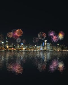 skyline buildings under fireworks display